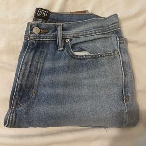 BDG ‘Dad Slim Taper’ light wash jeans from Urban Outfitters. Size 30x32